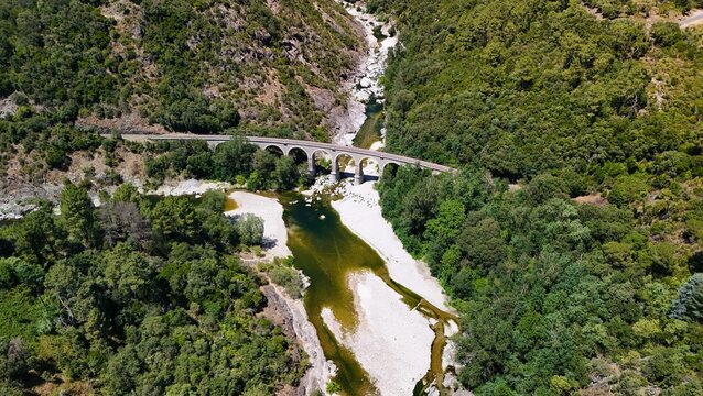 Aerial View of Historic Railway Bridge Crossing the Gardon River in Anduze, France