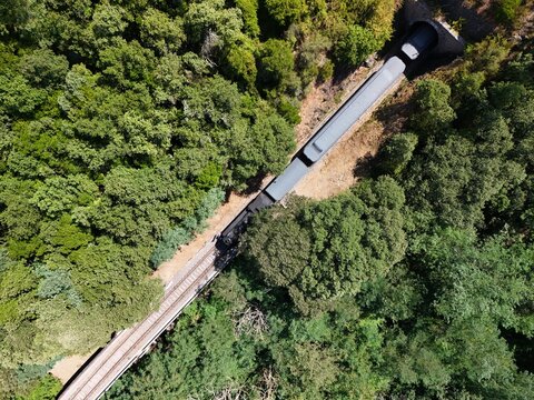 Aerial View of Historic Steam Train Through the C&eacute;vennes Forest near Anduze, France