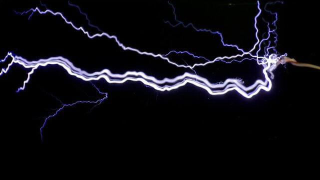 Colorful electric lightning discharge crackling on dark background, abstract motion background for modern creative