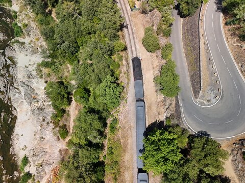 Aerial View of Historic Steam Train Through the C&eacute;vennes Forest near Anduze, France