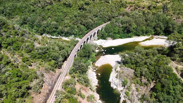 Aerial View of Historic Railway Bridge Crossing the Gardon River in Anduze, France