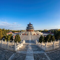 Naklejka premium Temple of Heaven in Beijing, China, a UNESCO World Heritage site, with its iconic Hall of Prayer for Good Harvests under a clear blue sky.
