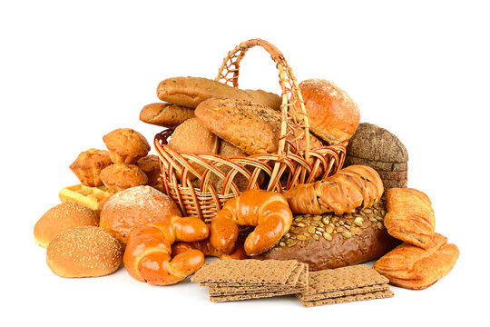 Large Variety of Fresh Baked Bakery Products and Different Bread in Wicker Basket Isolated on Pure White Background