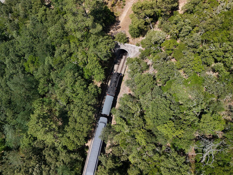 Aerial View of Historic Steam Train Through the C&eacute;vennes Forest near Anduze, France
