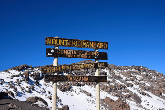 Historic Stella Point sign on Mount Kilimanjaro at 5,756 meters above sea level, marking a major milestone on the summit route in Tanzania.
