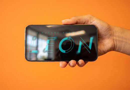 Mockup of mobile Phone by Orange Wall
