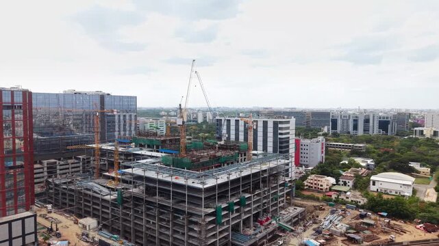 Large commercial office complex under construction in an expanding urban business district in Chennai India