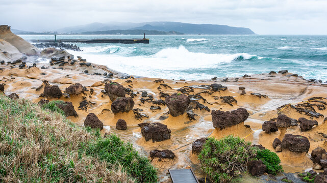 Scenic view of hoodoo stones rock formation in Yehliu geopark in New Taipei Taiwan