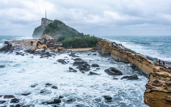 Scenic panorama of Yehliu promontory rock formation and tempestuous sea water in Yehliu geopark in New Taipei Taiwan