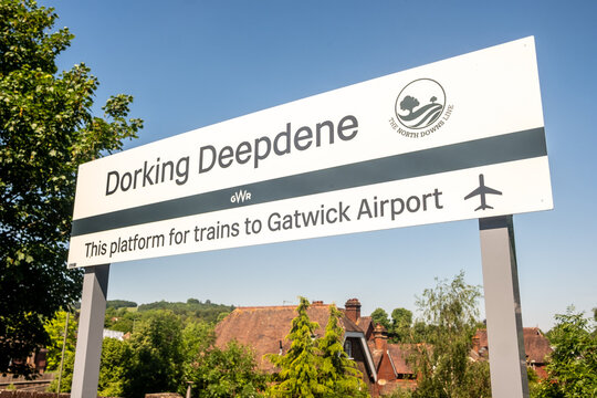 DORKING, SURREY - UK:  Dorking Deepdene station sign &ndash; Platform for trains to Gatwick Airport on the North Downs Line.