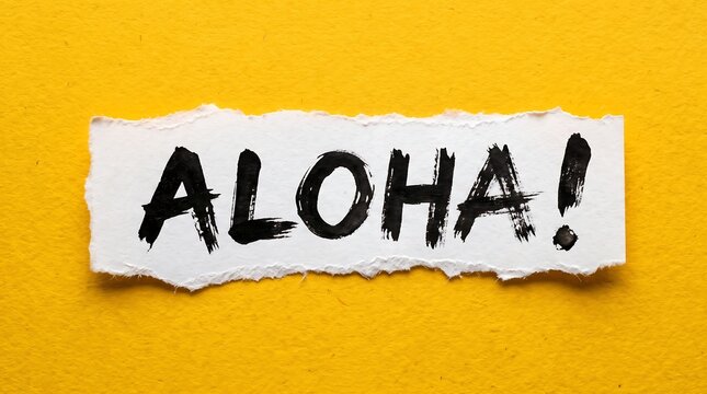Handwritten "ALOHA!" in black ink on a torn white paper strip, set against a bold, vibrant yellow background, perfect for creative travel themes, greetings, and expressive design projects.