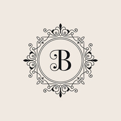 Elegant ornamental frame with letter b monogram in vintage style for luxury branding. © AbidGfx