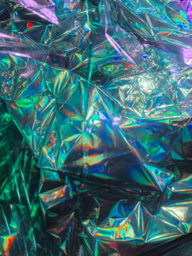 Crinkled holographic foil material