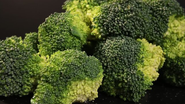 Fresh Broccoli Florets Close Up with Natural Green Texture in Slow Motion