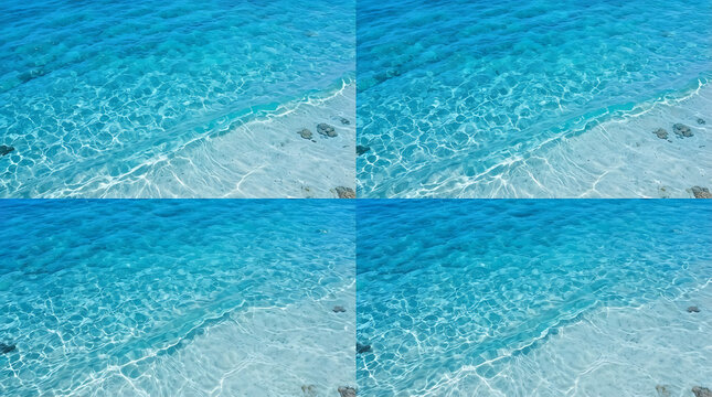 Aerial view of turquoise tropical ocean water gently lapping against white sandy beach with scattered rocks under bright sunlight with water washing