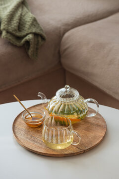 Herbal tea set on wooden serving tray for comfort