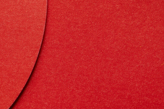 Minimalist Abstract Background of Layered Red Paper,Macro,A clean, minimalist close-up shot featuring layers of vibrant red textured paper, creating a soft curve and shadow that adds depth and modern 
