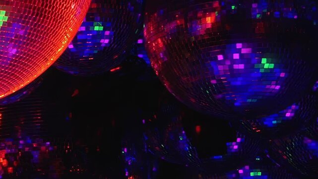 Experience the electric energy of a birthday celebration. Shimmering disco balls reflect a kaleidoscope of vibrant colors, creating a dazzling dance ambiance at night.