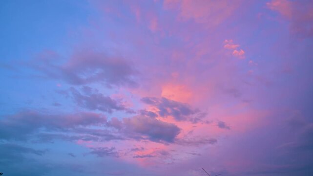 Dramatic Orange and Blue Sunset Sky Time-Lapse with Glowing Cumulonimbus Cloud Formation Moving Across Sky, Golden Hour Thailand