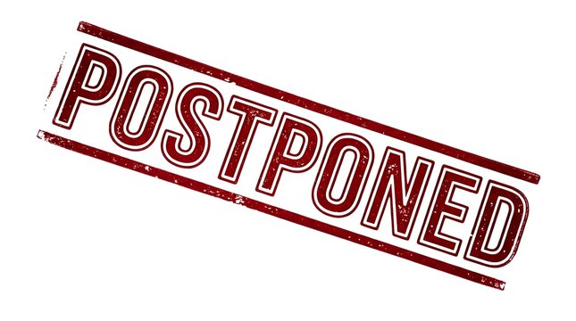 Postponed red ink rubber stamp on white background with stamp impression