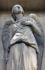 Fototapeta premium Archangel Michael, Madeleine church in Paris