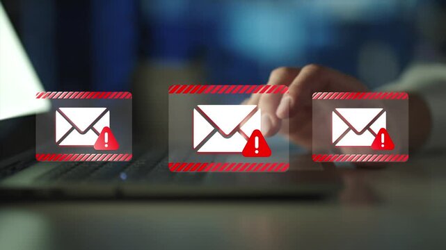 Phishing or malware emails. Warning alert is displayed. Security software detecting malicious emails. 