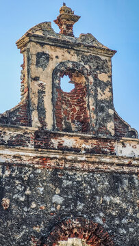 Close-up of the weathered bell gable and facade of the ruined St. Antony's Church, preserved as a reminder of the 1964 Rameswaram cyclone