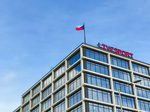 Prague, Czech republic - June 6, 2026: Czech republic flag waving above livesport building Prague 13 Stodulky