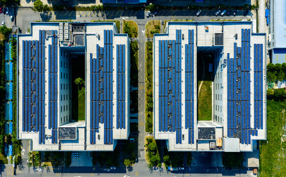 solar panels covering factory rooftop