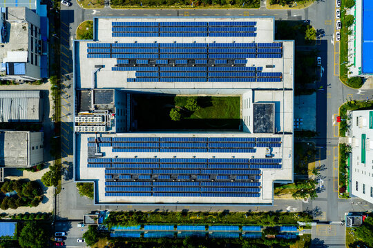 solar panels covering factory rooftop