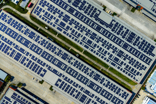 solar panels covering factory rooftop