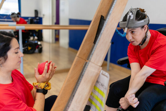 People practicing physical therapy during rehabilitation session