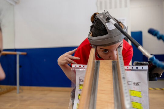 Woman measuring movement data in rehabilitation center