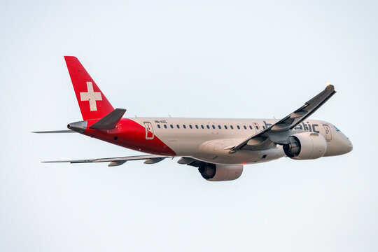Luqa, Malta - July 16, 2026: Helvetic Airways Embraer 190 E2 STD (ERJ-190-300STD) (REG: HB-AZC) taking off runway 13 in the sunset.