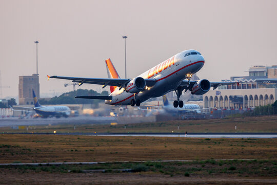Luqa, Malta - July 16, 2026: Lauda Europe Airbus A320-214 (REG: 9H-LON) departing runway 13 as flight FR1587 to Vienna for Ryanair.