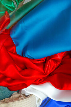 Colorful fashion industry textile materials background pile