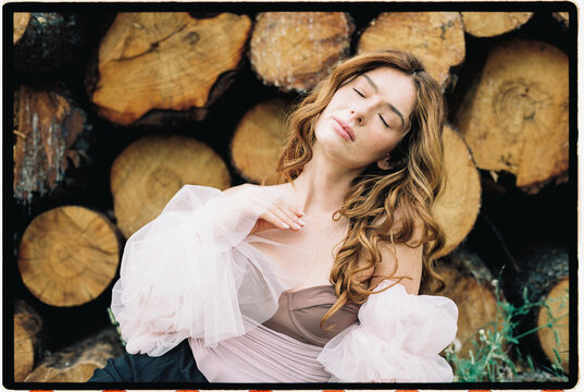 Woman in nature with closed eyes