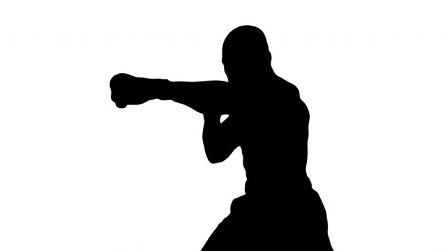 Silhouette of man boxing on white background. Black and white for composite and presentation. Alpha matte isolated.