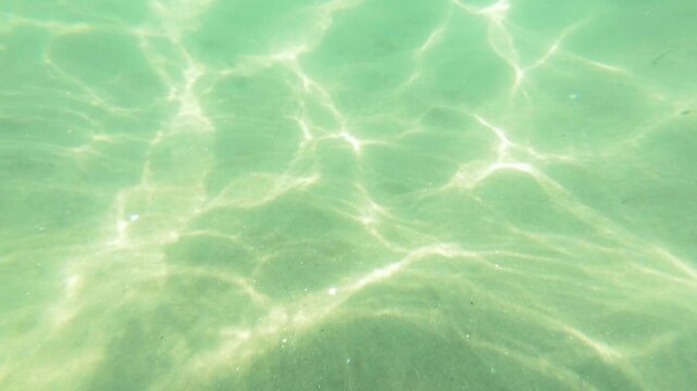 surface of clear sea with reflections