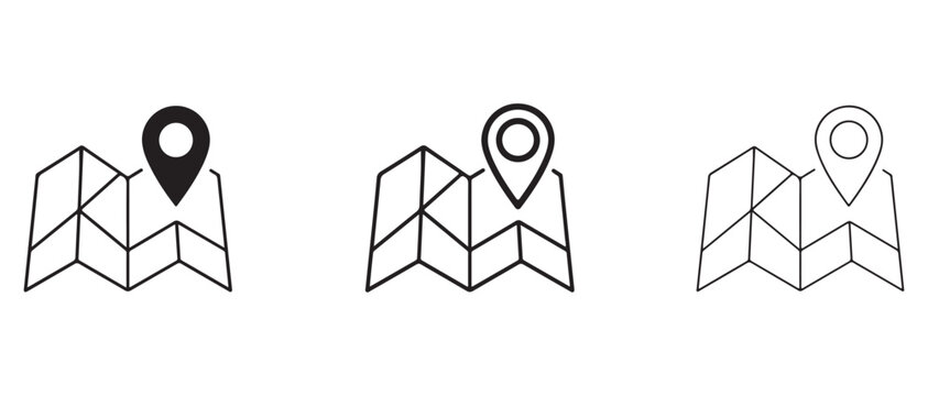 map location pin icons on folded map sheets for navigation and direction  location markers for travel and exploration purposes