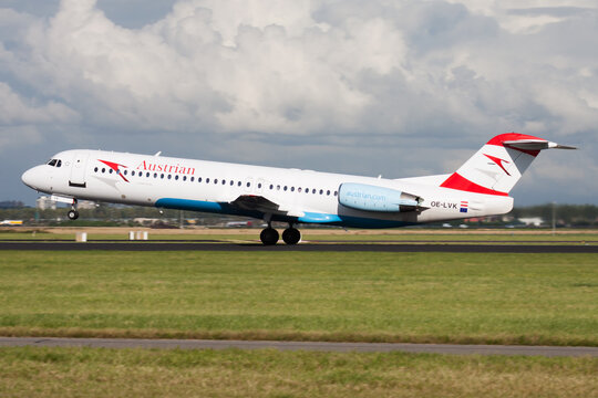 Austrian Airlines Fokker 100 (OE-LVK) taking off from Amsterdam Schiphol Airport on August 15, 2014 in Amsterdam, Netherlands