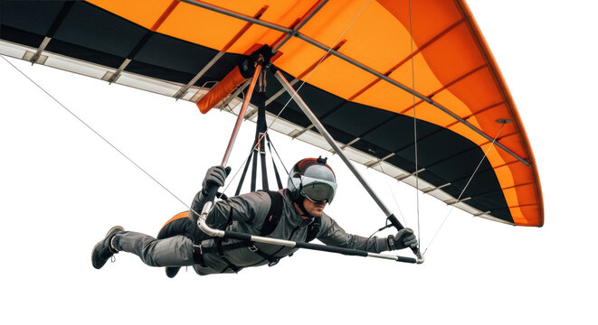 Athlete in charcoal suit, helmet, suspended by hang glider with vibrant orange, black wings, banking against transparent background, high-key lighting, weightless freedom concept