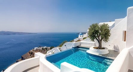 Obraz premium Luxury Santorini villa pool overlooking blue sea and white architecture.