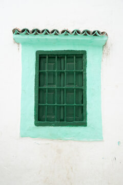 Charming green painted window in the Old Medina in Tangier, Morocco