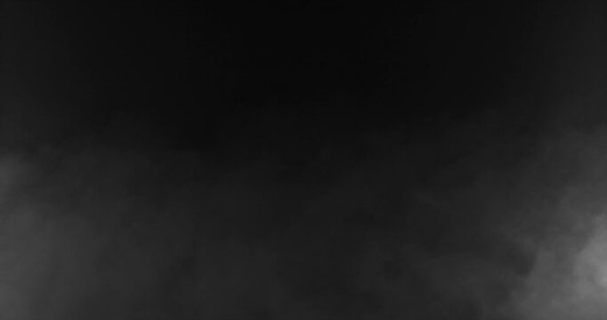 Detailed slow motion rising smoke isolated on black background. Cinematic fog overlay with soft swirling motion, ideal for VFX compositing, transitions and atmosphere.