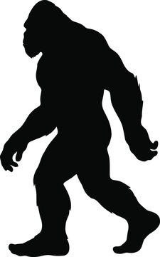 Black silhouette of a walking bigfoot or sasquatch creature 