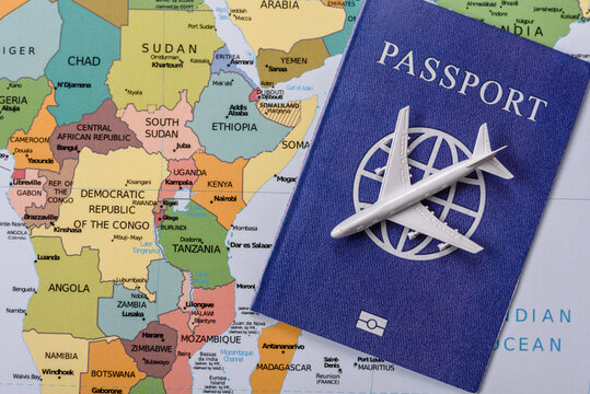 International passport against a map backdrop, concepts of travel. Passport on a map