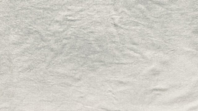 minimalist off white woven fabric texture shows fine organic linen threads in a serene flat lay composition