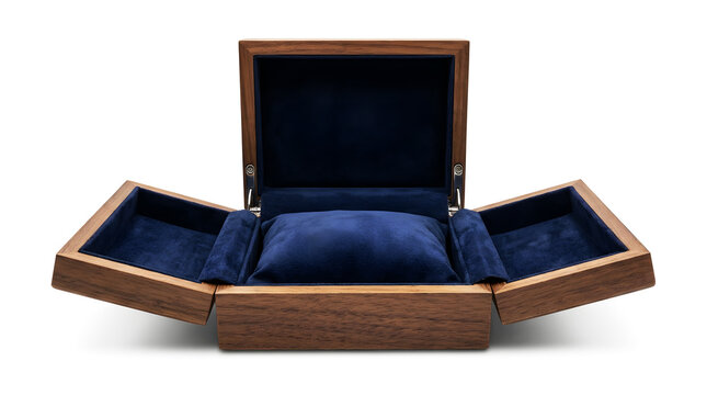 Open wooden watch box with blue velvet interior isolated on white background