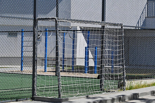 Built-in football goals on sports pitch